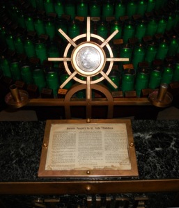 Bronze compass above the prayers to St. Jude at the Dominican Shrine in Chicago